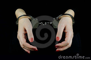 handcuffed-woman-hands-23378968