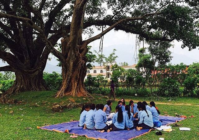 Schools reopen this week in ‪#‎Nepal‬ after the 25 April ‪#‎NepalQuake‬. This one, under the cool shade of a majestic banyan tree in Salyantaar, close to Gorkha. Photo by @mikaness via Nepal Photo Project. Used with permission