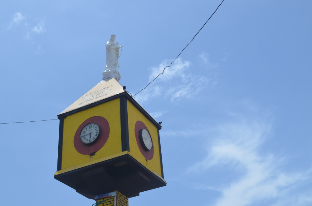 clock tower and the statue