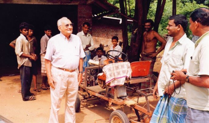 ray-wijewardene-talking-about-agricultural-machinery-to-staff-at-a-farm-in-anuradhapura-district-sri-lanka