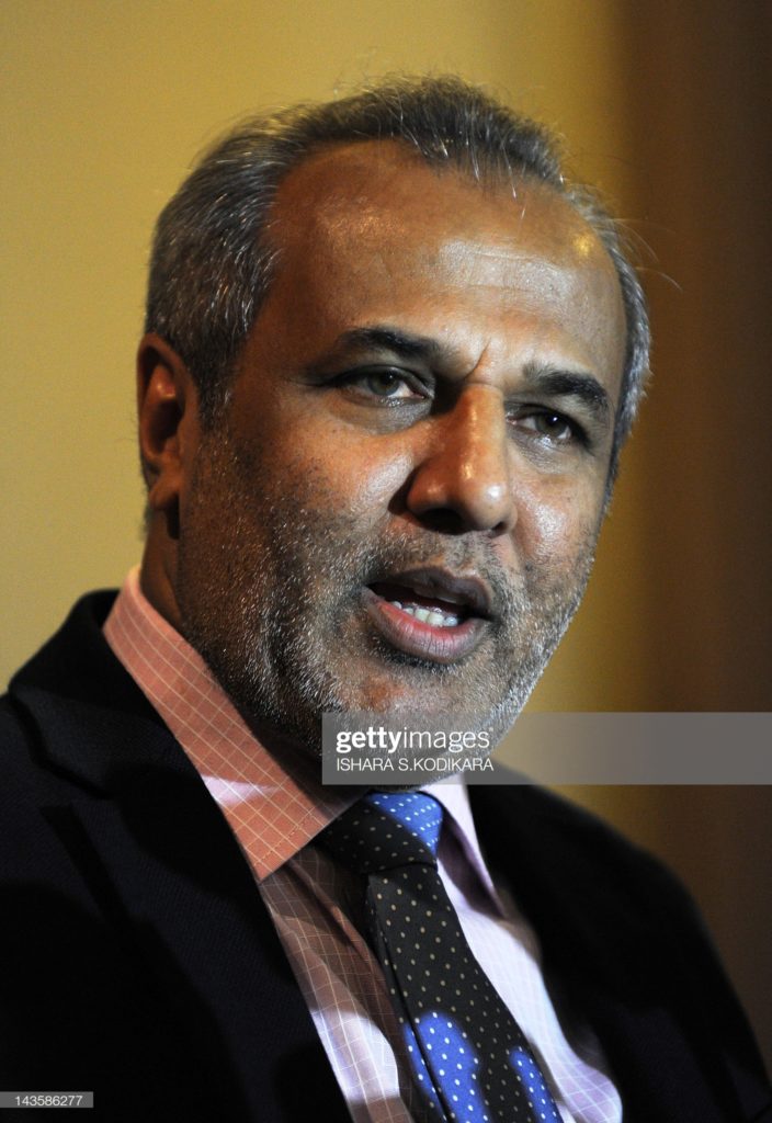 Sri Lankan Minister of Justice, Rauff Hakeem speaks during a press conference in Colombo on April 30, 2012. The Sri Lanka Muslim Congress (SLMC), which is also a member of the ruling coalition, said it opposed relocating a 60 year old mosque in Dambulla, 150 kilometres (93 miles) north of Colombo, in response to a demolition demand by Buddhist monks. The monks had argued that the mosque was inside temple land and should be demolished while the Muslims maintain that they have been offering prayers there since the mid 1940s. The government said in a statement last week that it offered three alternate locations for the mosque and had also agreed to finance the building of a new mosque, an offer firmly rejected by the SLMC. AFP PHOTO / Ishara S. KODIKARA        (Photo credit should read Ishara S.KODIKARA/AFP/GettyImages)